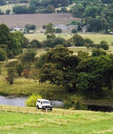 Land Rover sitting by the river Tyne, Chester's Roman Fort. This truck belonged to an archeological company that was doing untrasound mapping.