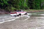 Mike Allan of NCOAS crosses the Quesnel channel first.