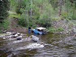 Almost through, but hung up on huge rock that Kris just missed. Get out the winch!