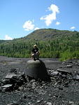 Matt on a dinosaur egg at the Greenwood smelter.