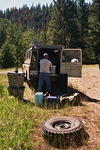 Shawn replacing tire with slow leak at Granite townsite