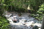 Pathfinder crawls through creek bed.