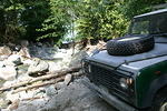 90 waits for others before crossing creek