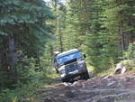 11. Shawn's 109 crossing roots & rocks.JPG