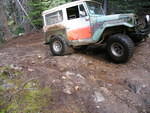 Almost rubbing the arches on the rocky hill.JPG