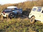 32,000 pound pull. It took 2 8000 lb. 8274 winches, both snatch blocked, to pull shawn out of what had looked like a pretty solid piece of ground a few minutes before.