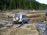 Don MacDonald tries a different section of the creekbed to cross.