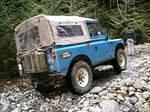Dave's Series IIA pauses on the rocky ice as he spots out the route ahead.