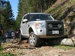35. LR3  air suspension is not quite as tall as this log!...jpg