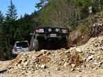 The LR3 pulling Jason back off the rocks.