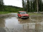 Big Daddy Tebbutt in his Rangy into the puddle.