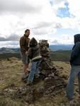 Bailey puts another rock atop cairn #2.