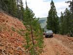 Going down the 'red rock' portion of the Placer Traverse.