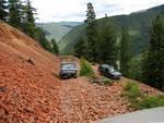 Andy clears the switchback with John & Jeremy following.