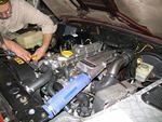 9. Big boys with big toys! Bernie tweaks his new motor.jpg.jpg