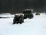 Heading for the river is Bill Eastwood followed by Pete Lembesis in his Unimog.