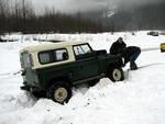 Dave gets Bill hooked up to the Unimog for a tug out.