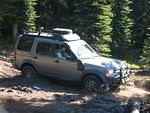 020 JC's LR3 into the mud.JPG