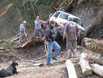 A log rolled under the Toyota and got stuck underneath