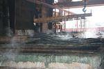 Parts being transferred from tank to tank at Silver City.jpg