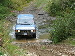 028 John with muddy wheels.JPG