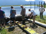 12 Strapping the bags into position.JPG