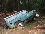 Pete backs into a hidden ditch...Opps!