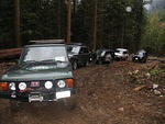 A little bit of rain and mud doesn't dampen the spirits!