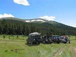 Looking up at Poison mountain, you can just about see a vehicle against the cloud parked on the top - August 2012 038