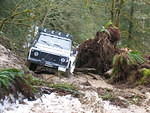 Iain in his Defender 110 tackles the slop ...