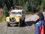 Don McDonald's rig lies idle while he marshalls the course.