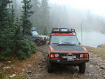 A pair of Rangies and an Alpine lake.