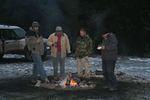 Lots of gathering around the fire
