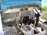 Old engine removed, firewall stripped and a layer of sound deadening material applied.