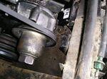 I had to trim the bracket on the left side of the frame. Also note the fan and fan clutch removed and the nut filed off.