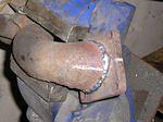 The turbo output pipe that come on the Peugeot interferes with just about everything, the firewall, the engine crossmember and the front driveshaft. One had to be fabricated. First I located a unit off a late 90s VW turbo diesel which exits directly do...